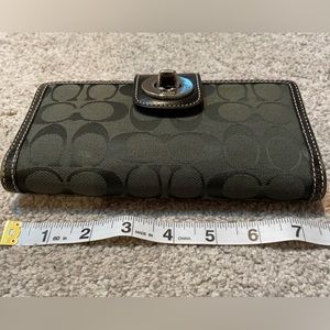 Hunter green full sized authentic Coach wallet with checkbook cover.